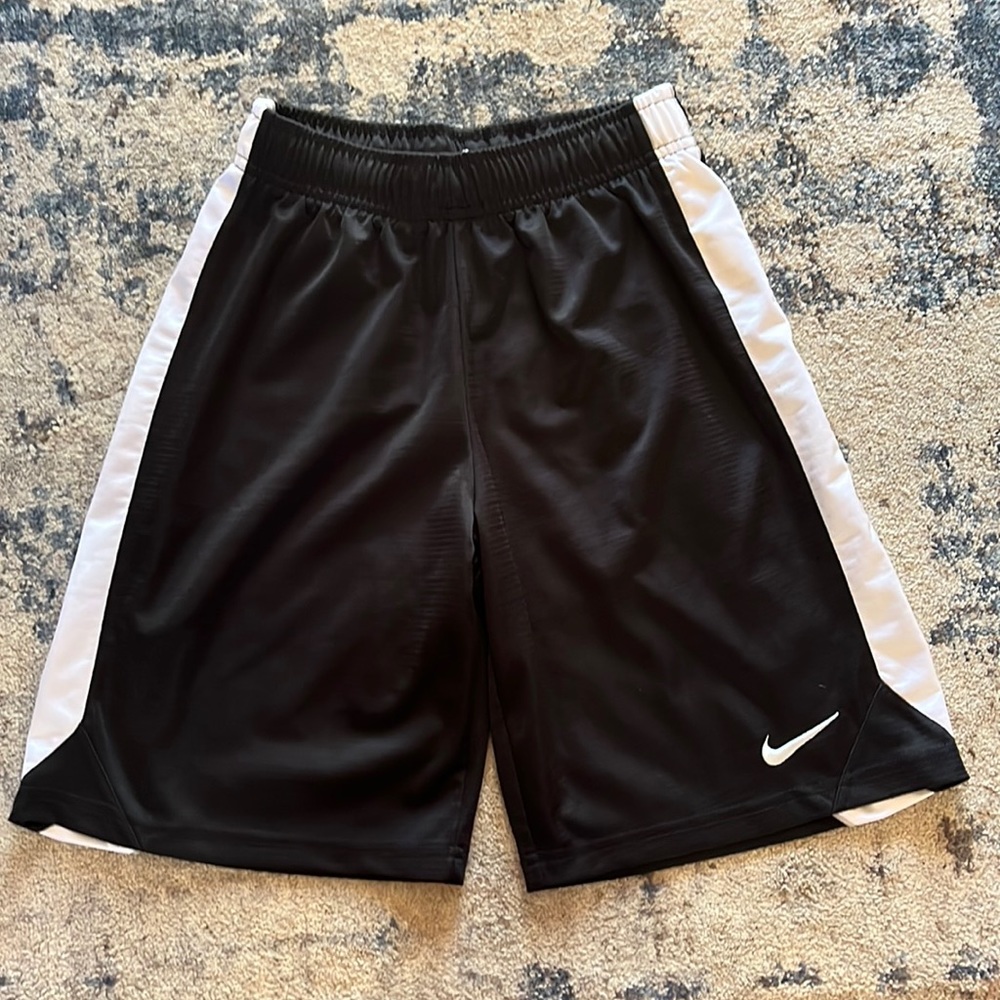 Nike basketball shorts (Adult small) (Kids Large)